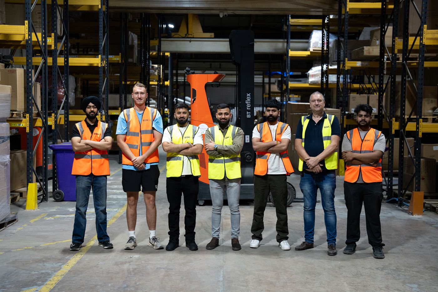 The SGK team together in the warehouse